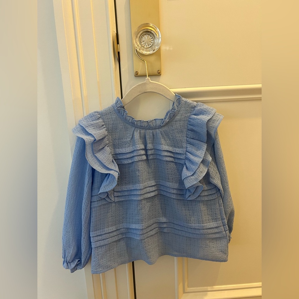 REISS child’s blouse size 5-6 but fits like a 4-5